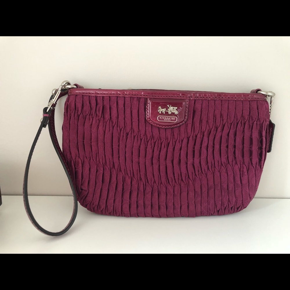 Purple coach wristlet